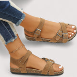"Inka™ | Kork-Kreuzriemen-Sandalen" can be rewritten as "Inka™ | Kork-Sandalen mit Kreuzriemen".