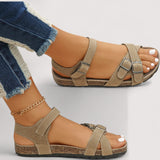 "Inka™ | Kork-Kreuzriemen-Sandalen" can be rewritten as "Inka™ | Kork-Sandalen mit Kreuzriemen".
